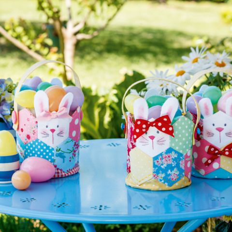 Styled shot of three easter egg carry bags with bunny head