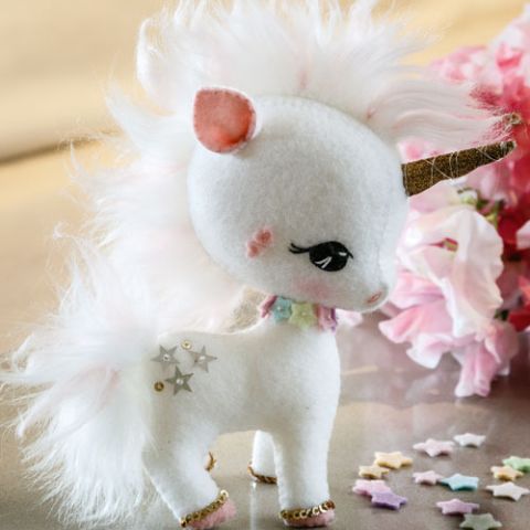 styled shot of rainbow unicorn softie